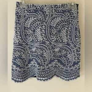 LOFT Petite Chambray Eyelet and Embroidered Mini Skirt 
Size: 0 Petite 
GUC
